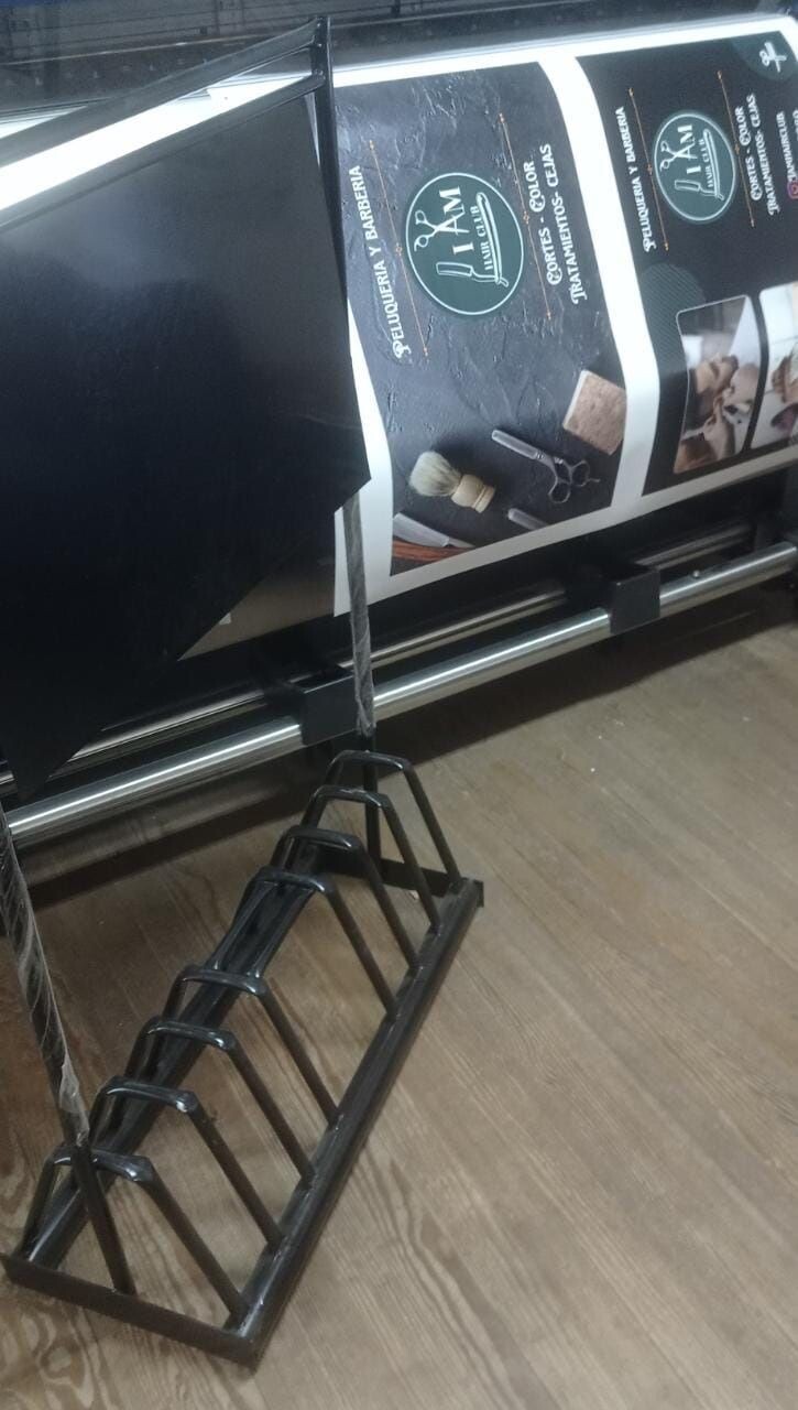 Bicicletero con cartel sale