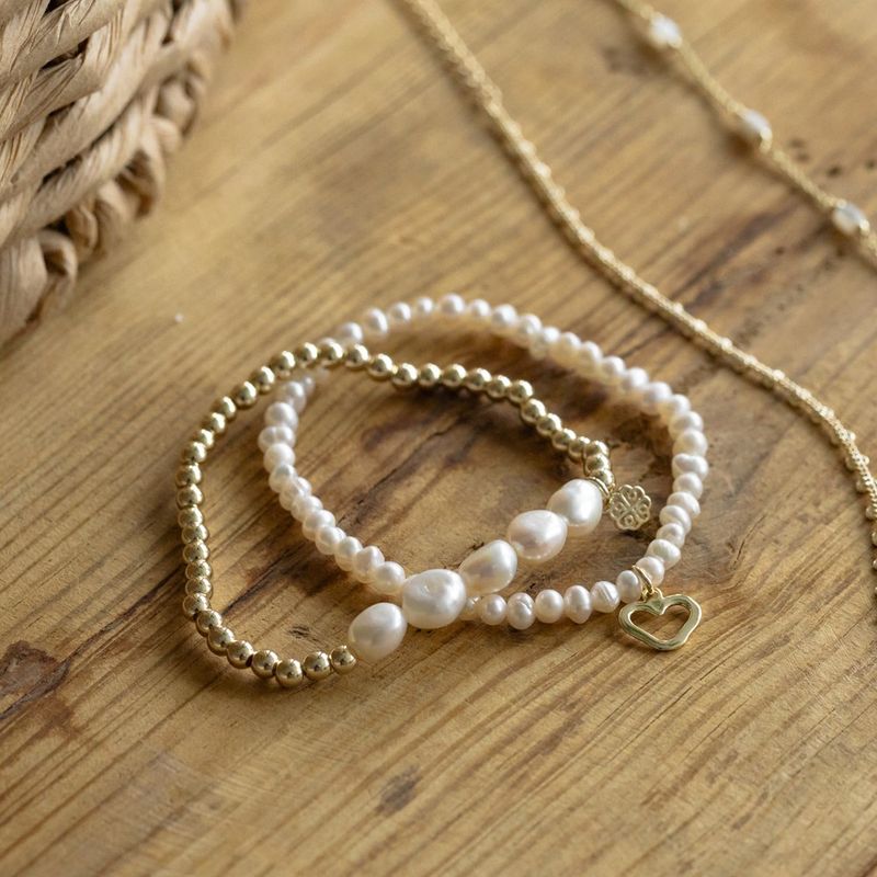 Amore pearl bracelet with heart charm