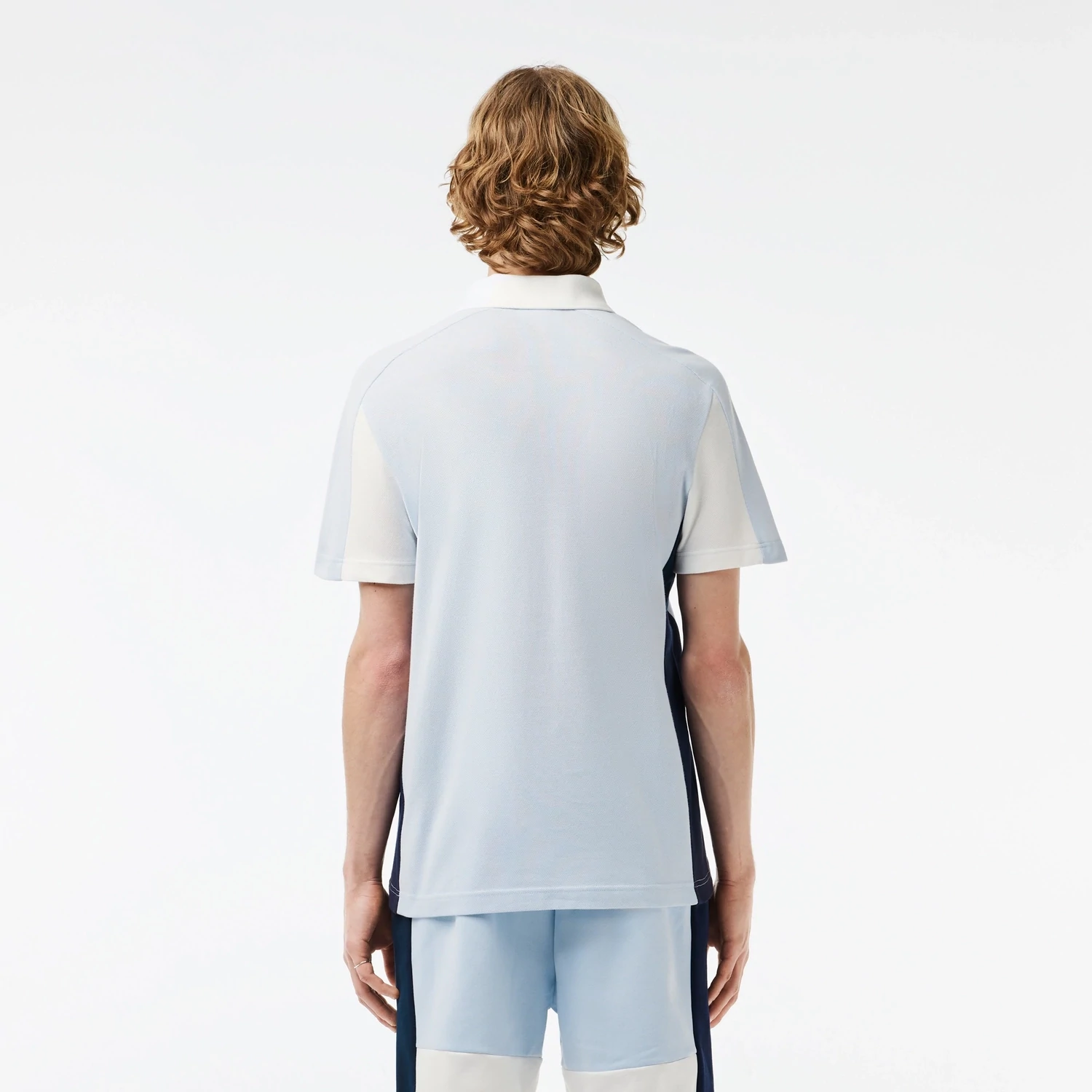 Lacoste PH1302 52 IHJ men’s short sleeved polo with stripes on side light blue