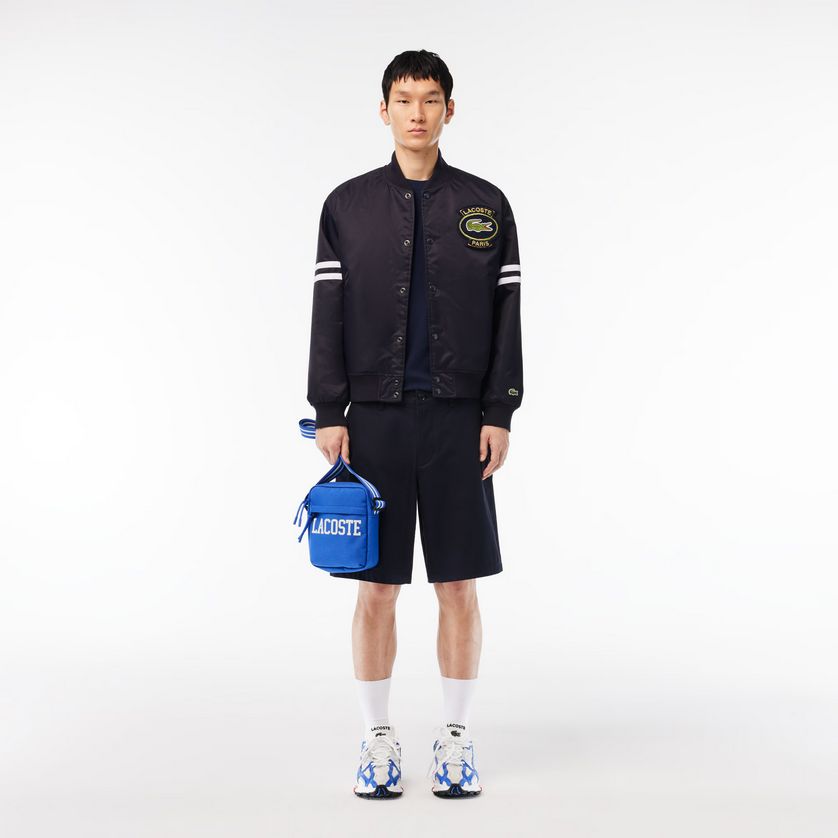 Lacoste NH4606NZ Men’s Vertical Camera Crossbody Satchel Bag – Blue