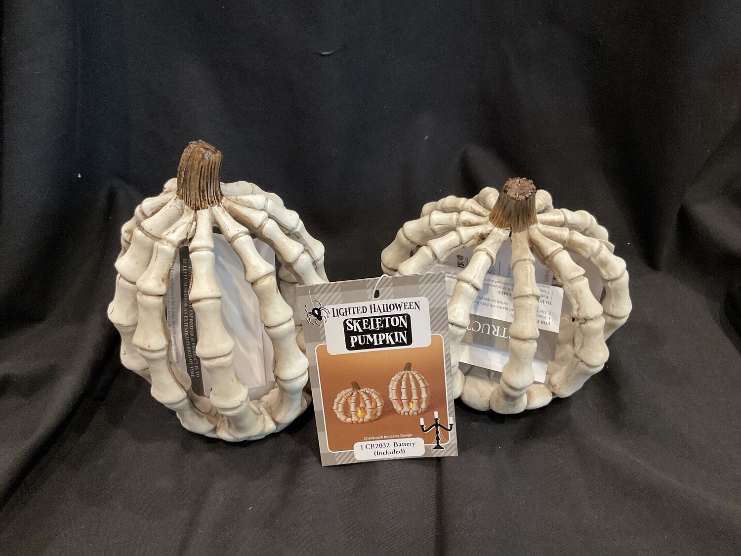 Lighted, hollow, skeleton pumpkin