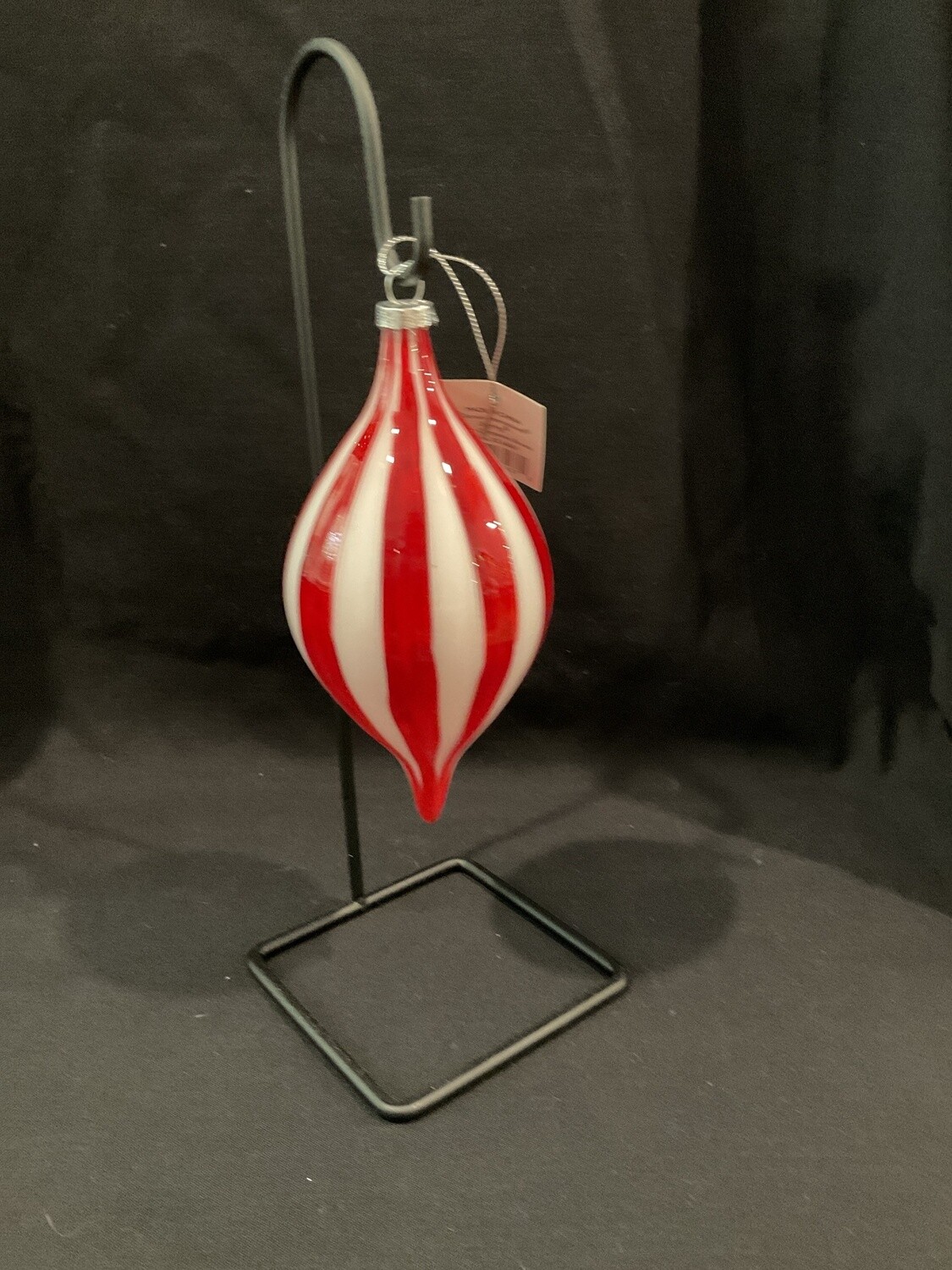 Red and white striped glass ornament