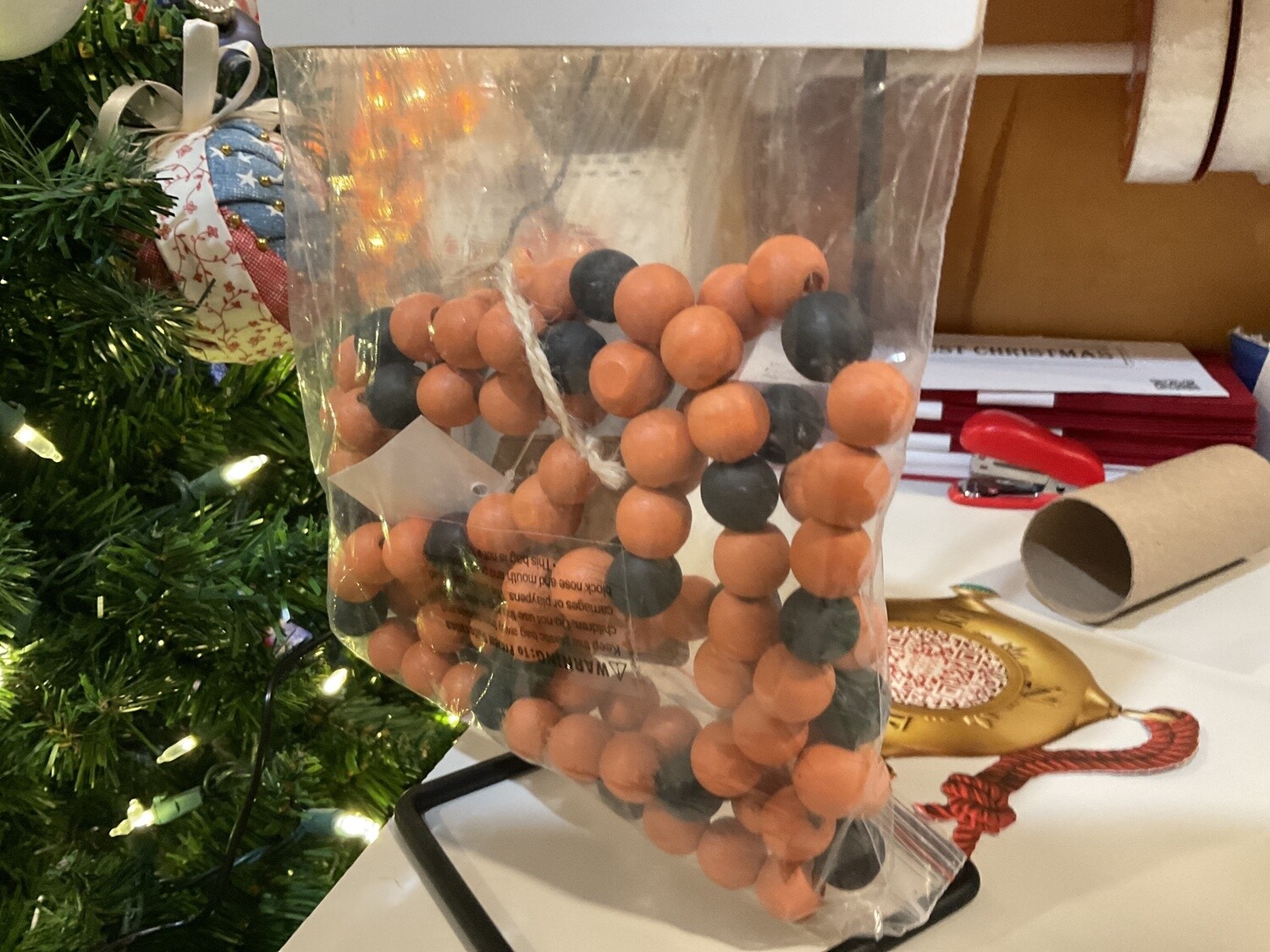 Orange and black wood bead garland