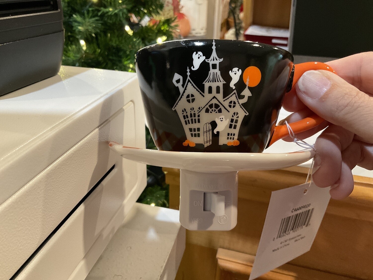 Haunted house, teacup, nightlight