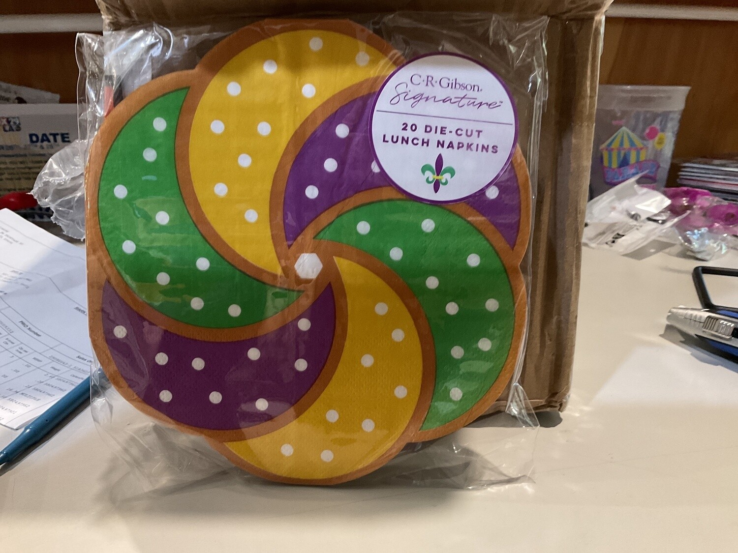 Mardi Gras king cake, napkins