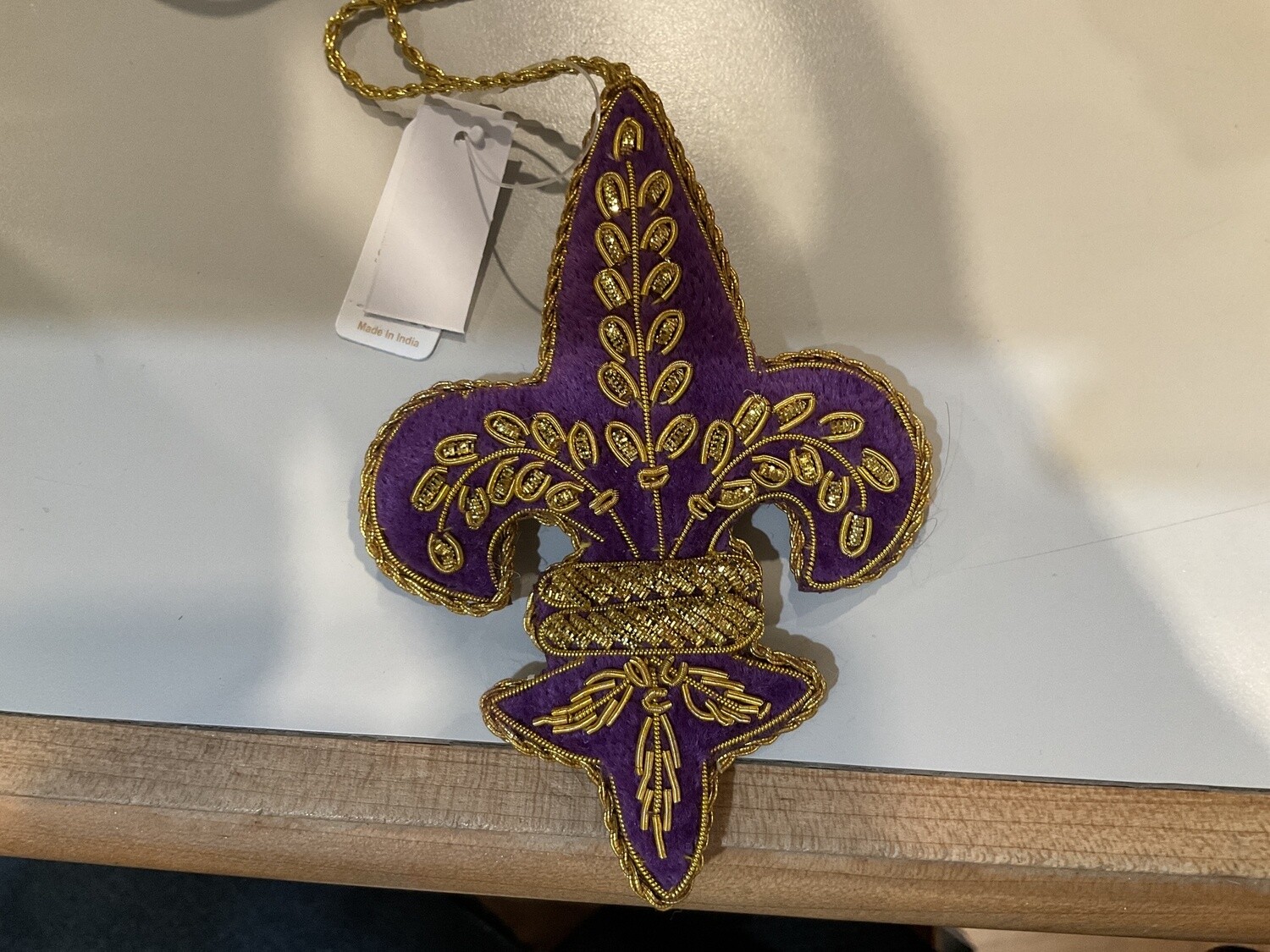 Embroidered fleur-de-lis, purple and gold ornament