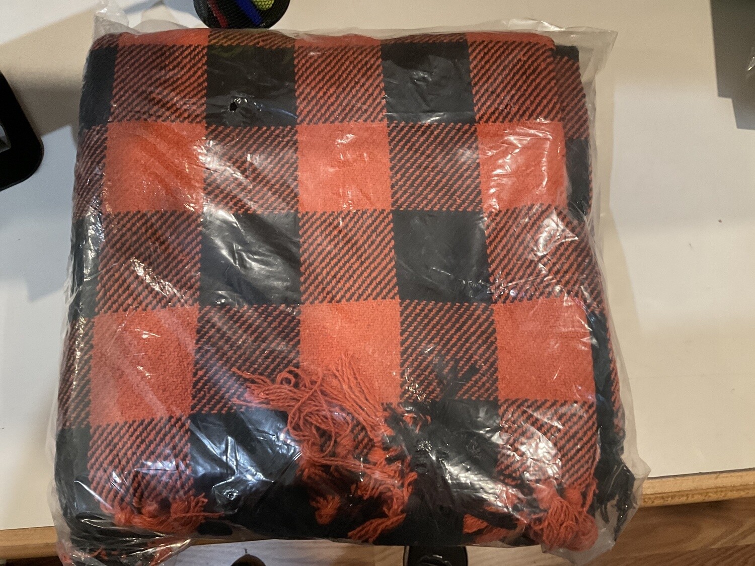 Orange and black throw