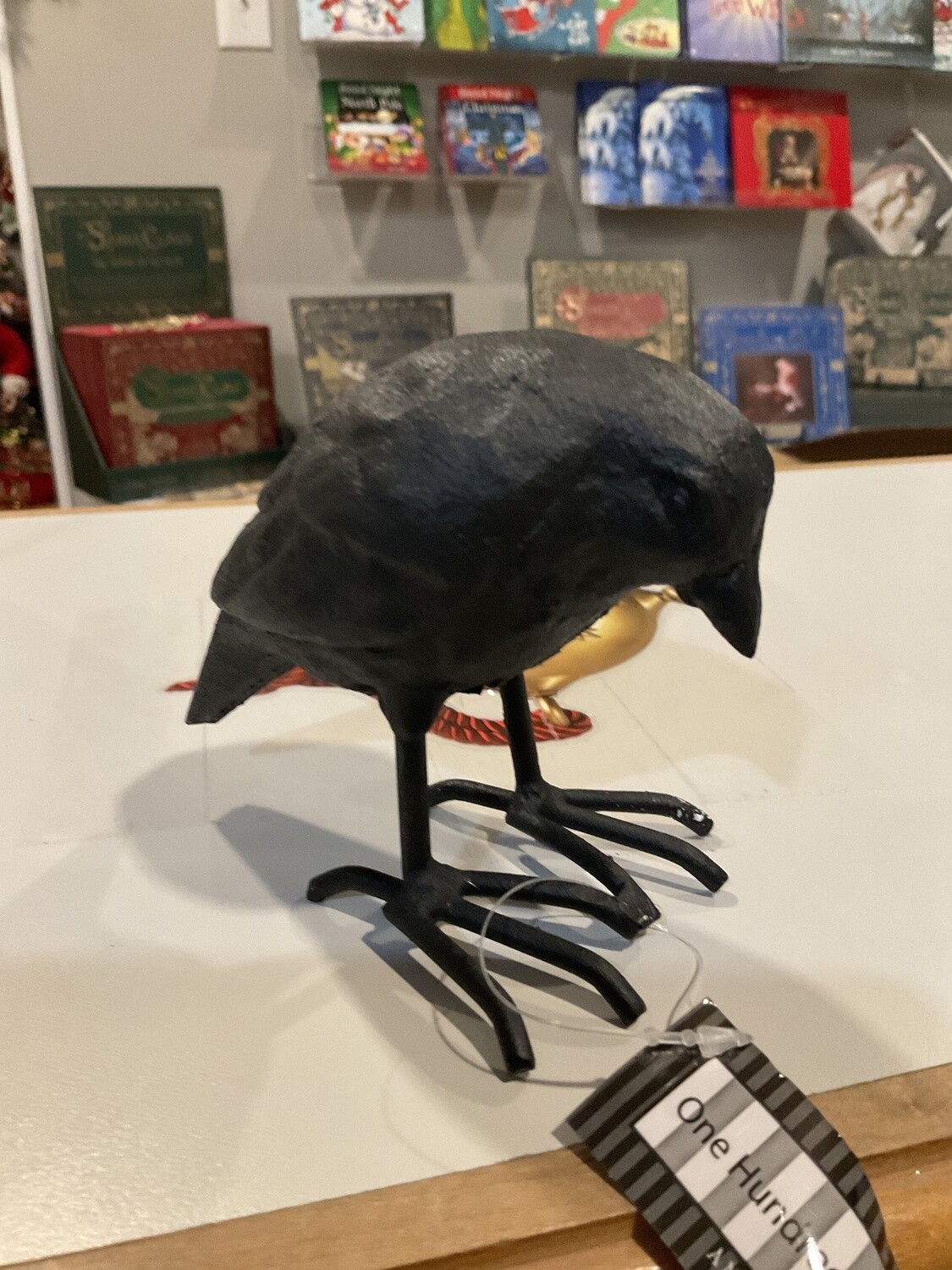 Small cast iron raven