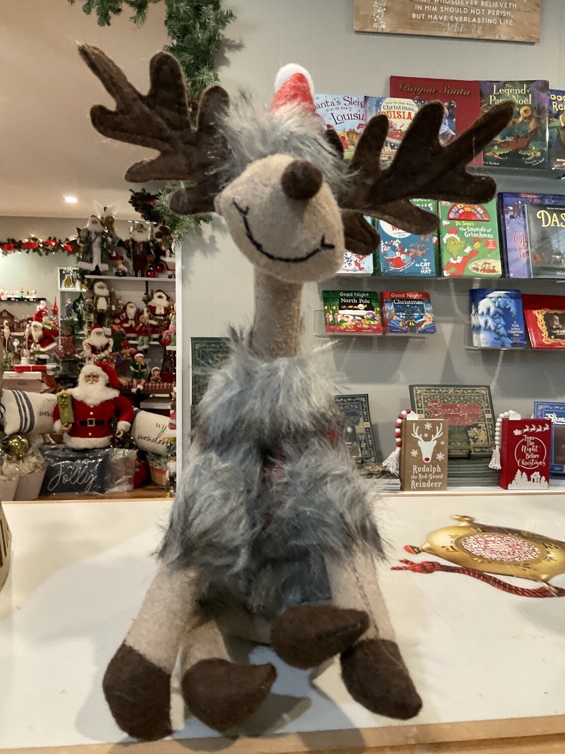 Sitting plush, longneck reindeer