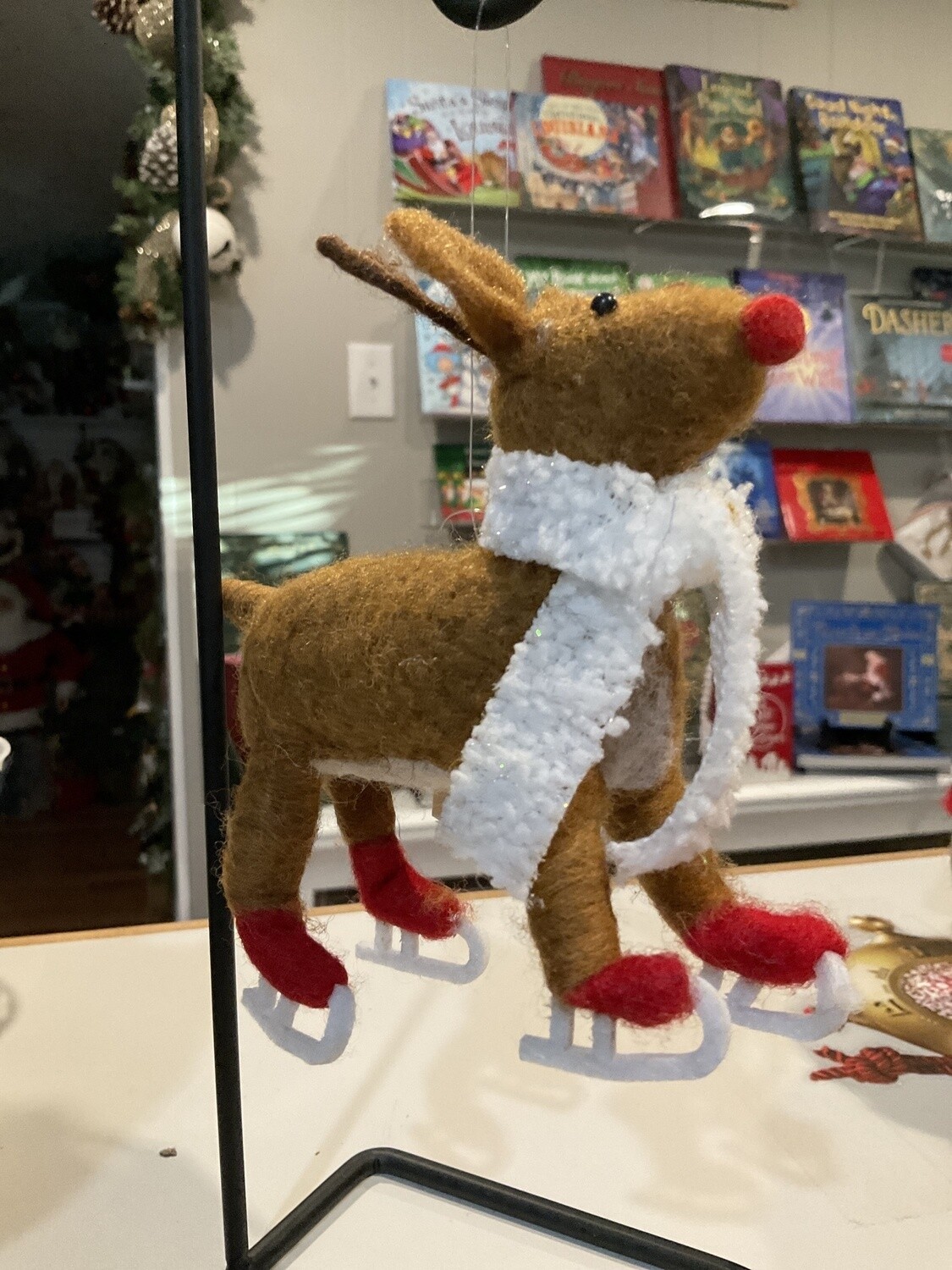 Skating reindeer ornament
