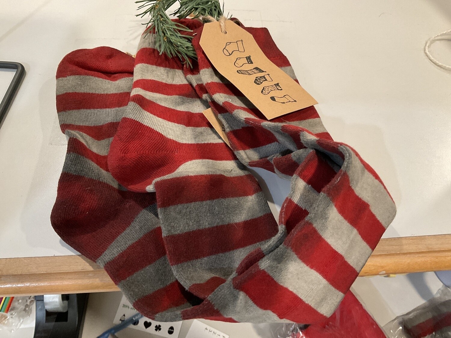Primitive, red striped stocking ornament