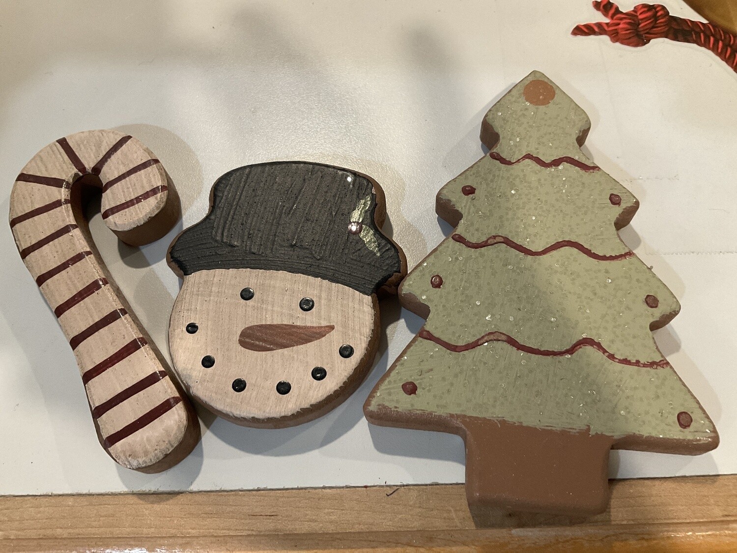 Set of three snowman candy, cane and tree wooden Christmas cookies