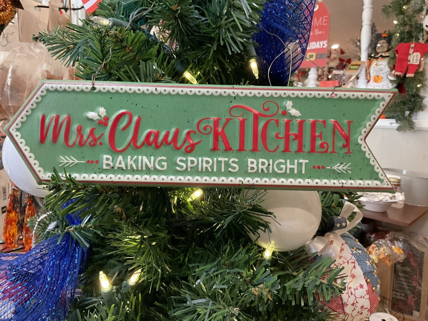 Mrs. Claus’s kitchen metal hanging sign