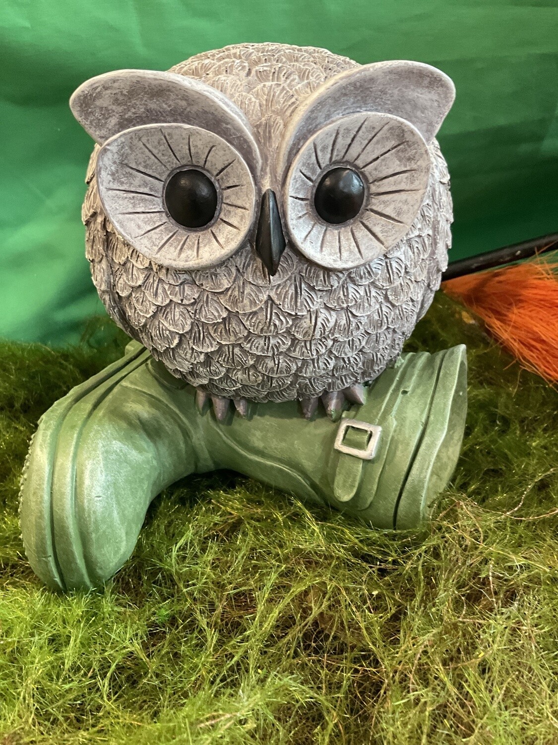 Owl on boot statue