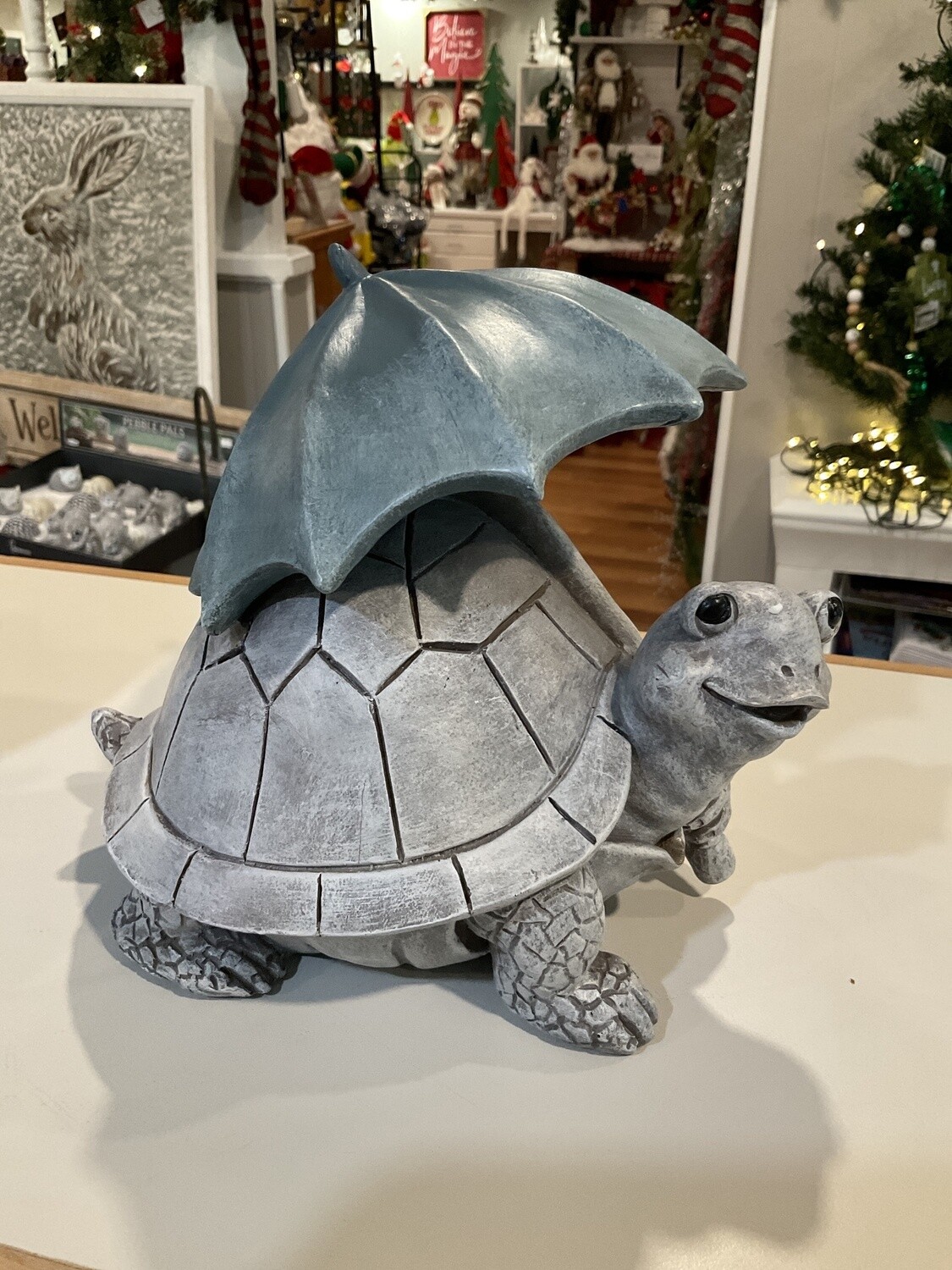 Turtle with umbrella statue