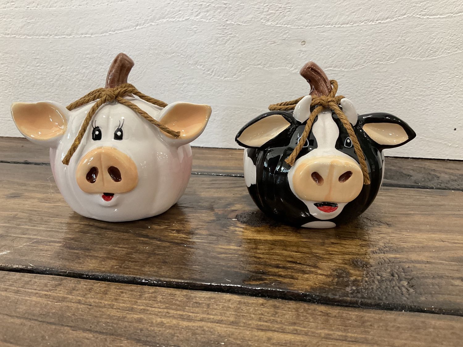 Ceramic pumpkin, head, pig, and cow