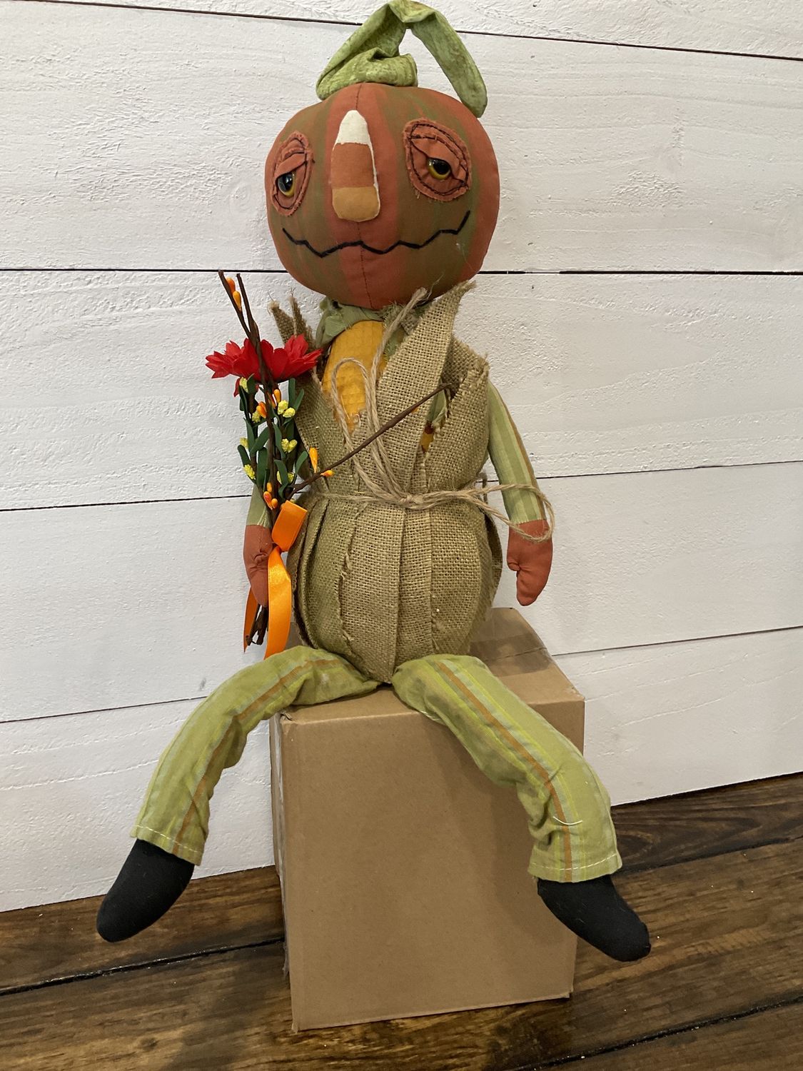 Ezekiel pumpkin head, corn figure