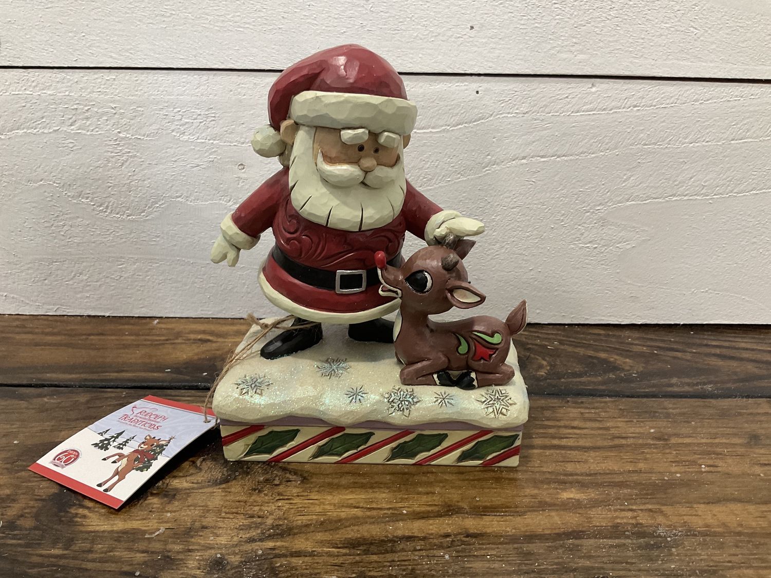 Santa petting Rudolph