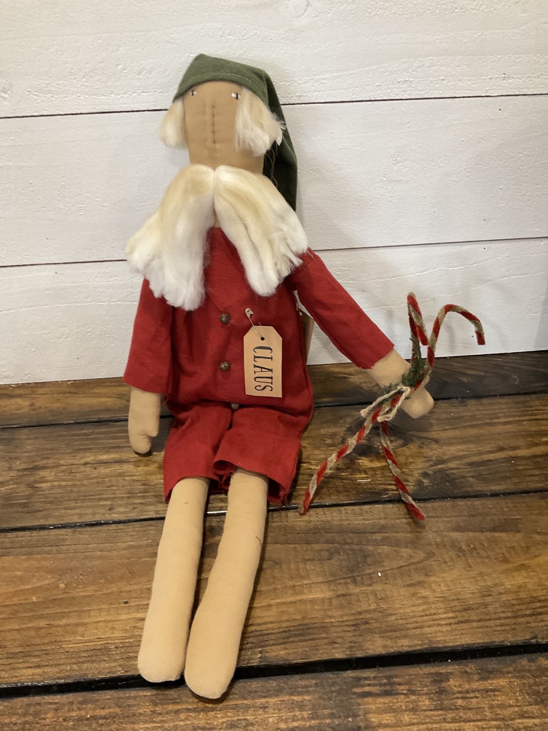 Winter nap Santa doll with candy canes