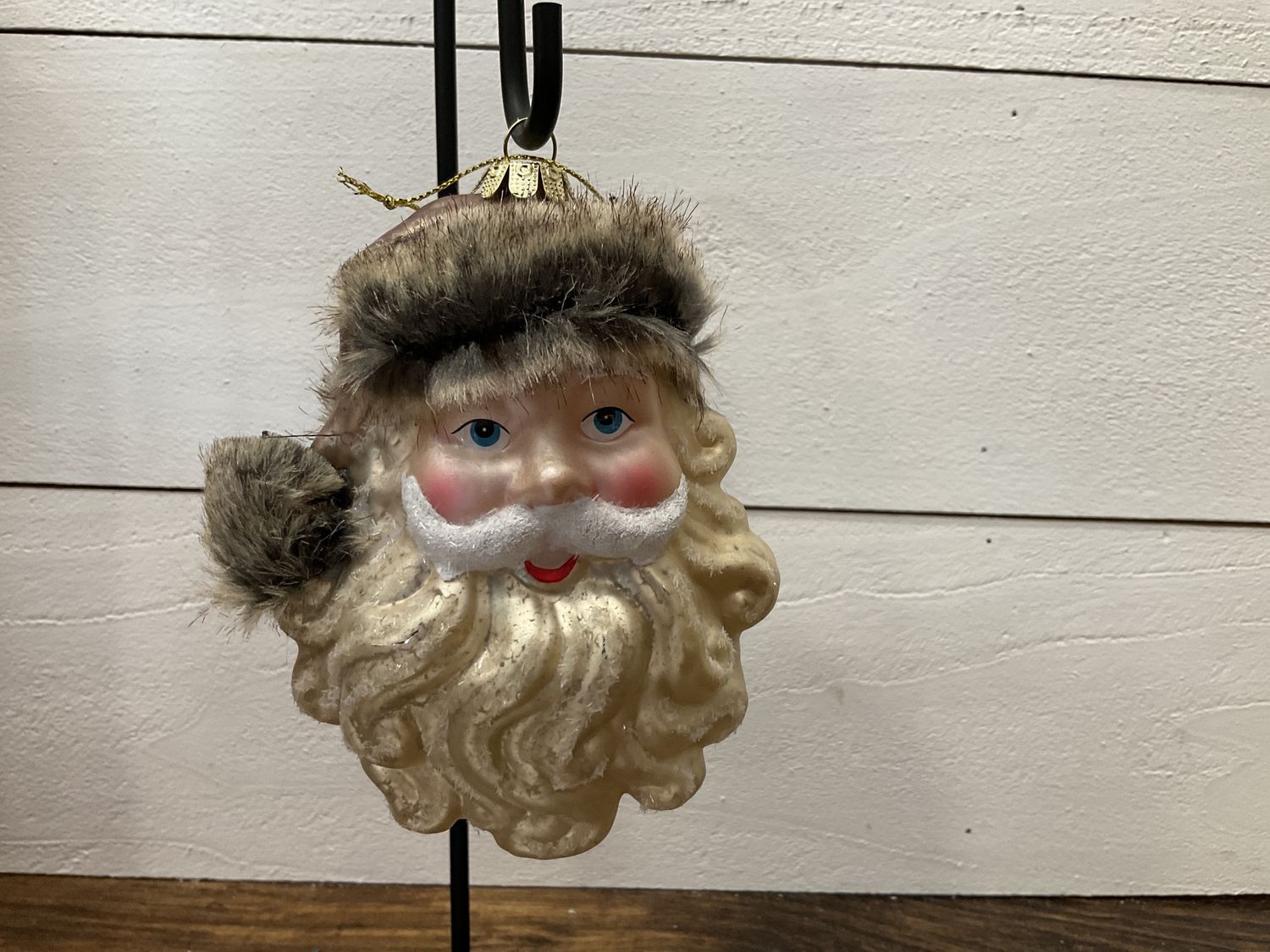 Glass Santa head with brown fur