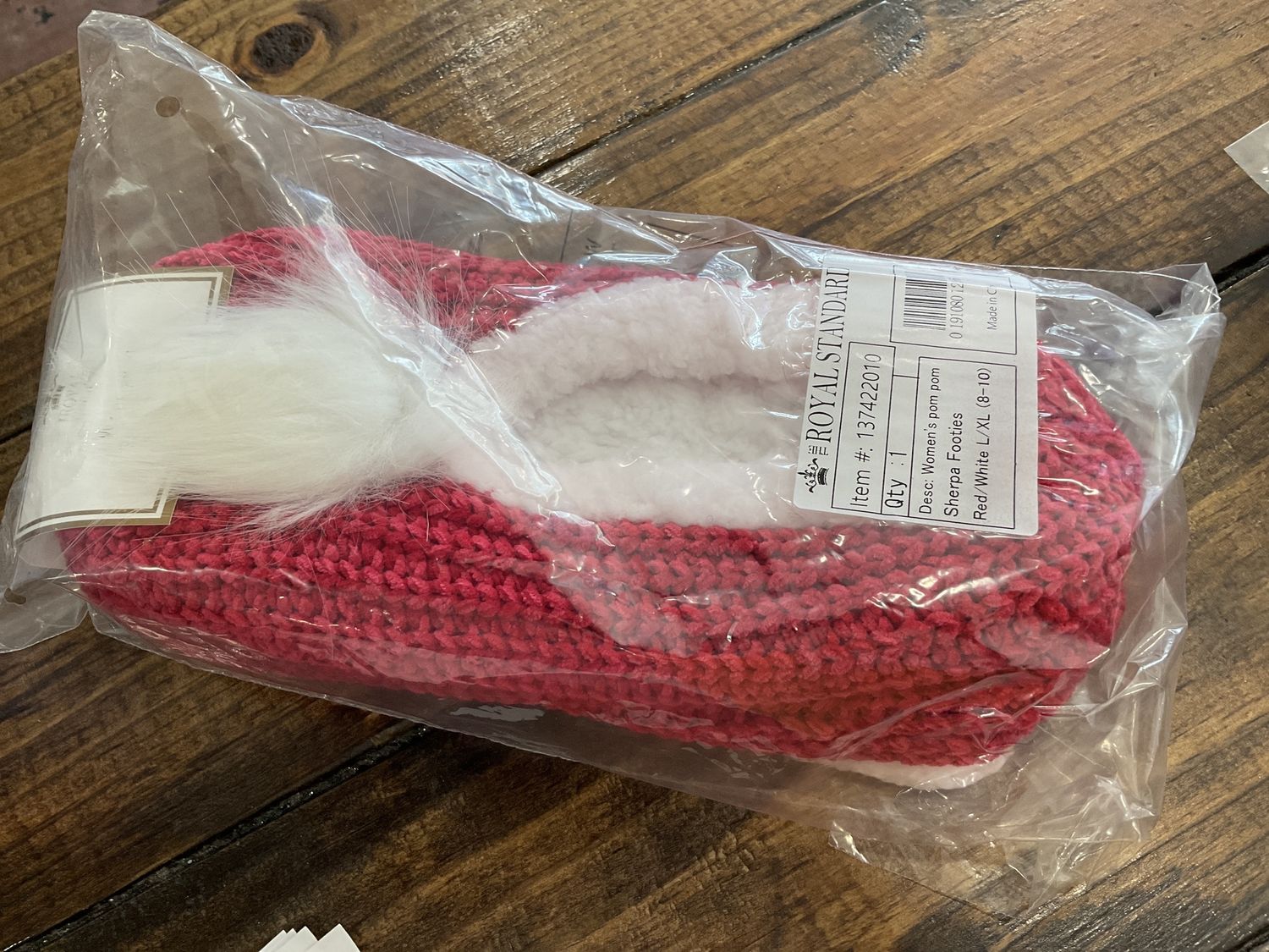 Woman’s pom-pom footies