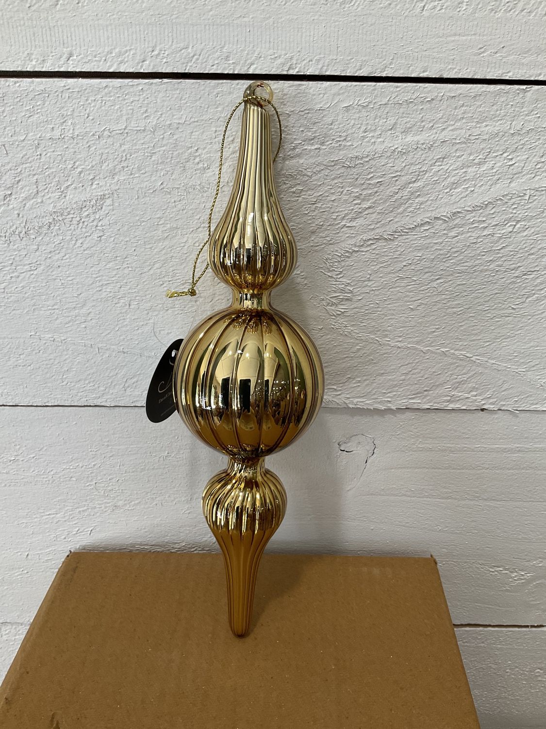 Shiny antique gold finial
