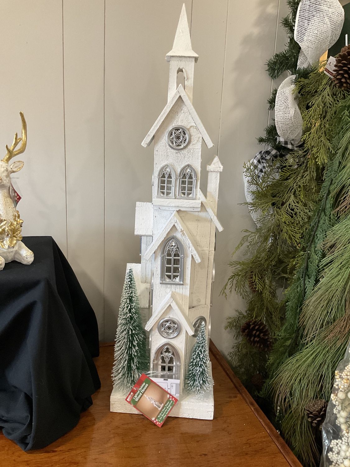 Lighted wood holiday house
