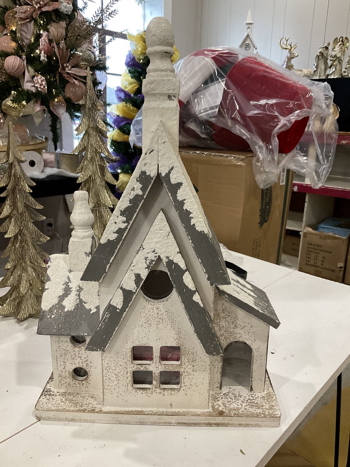 Wood frosty winter house with LED light