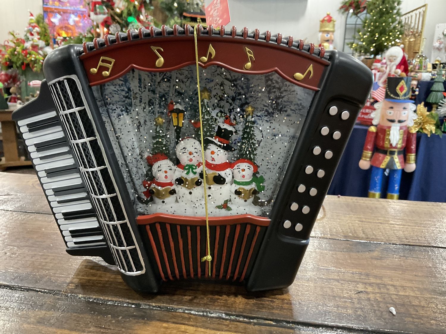 Lighted swirl accordion Snowman carolers