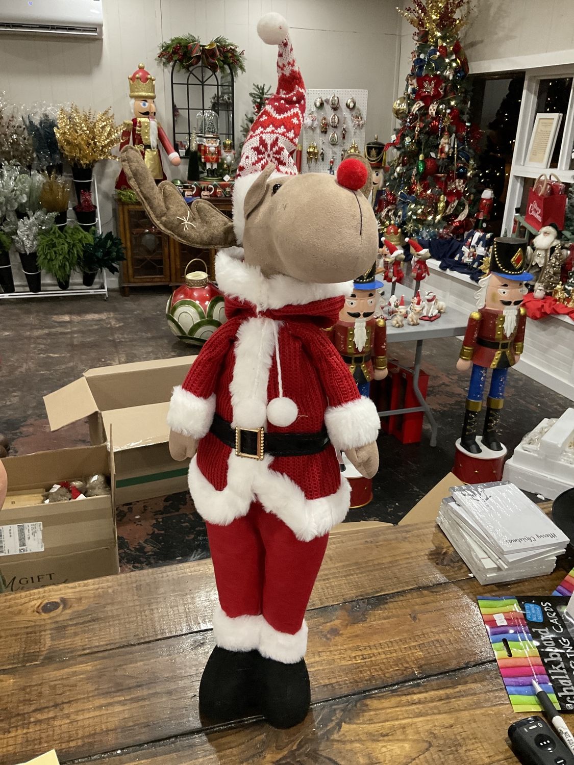 Santa Claus standing reindeer