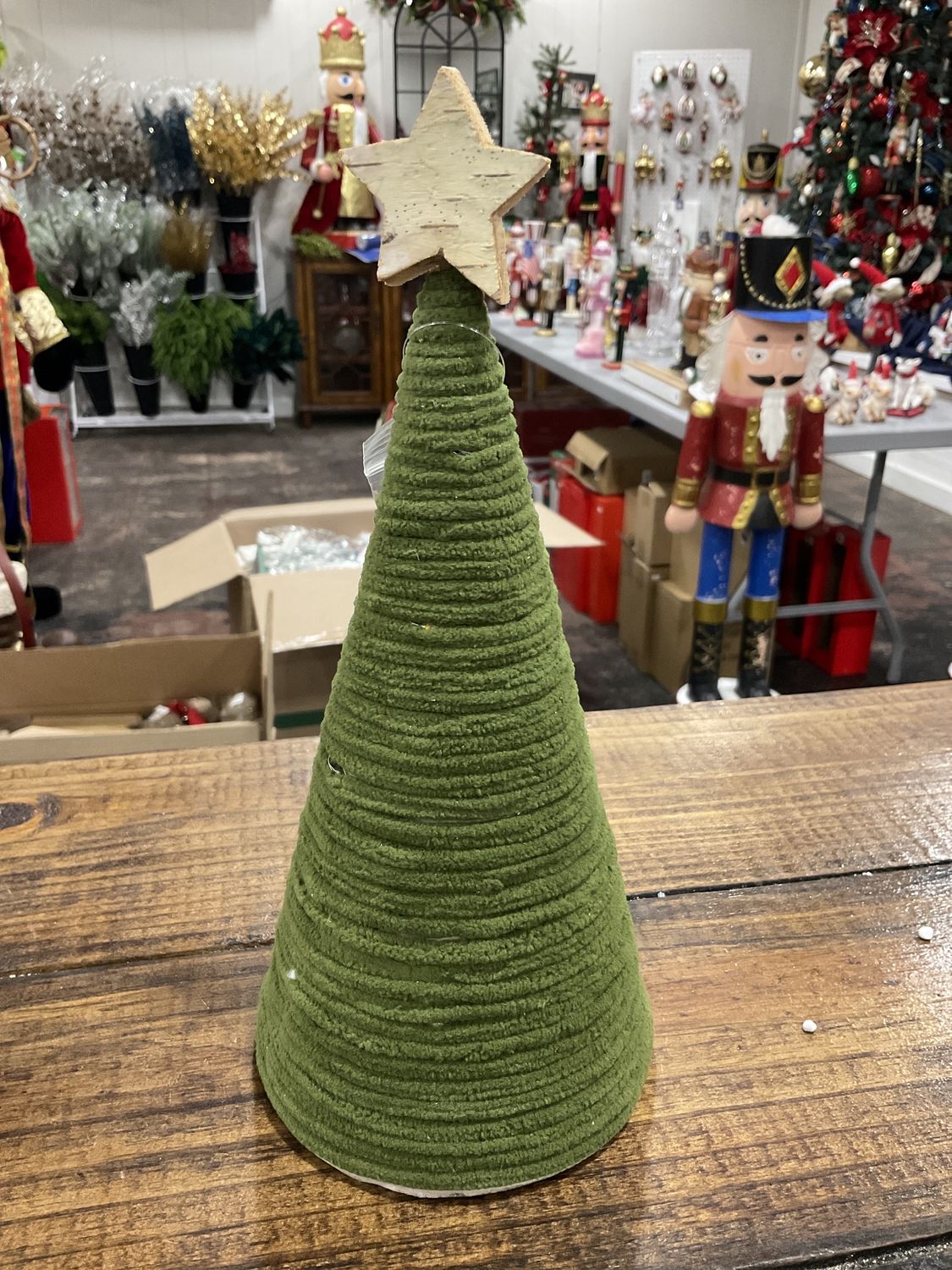 Green yarn Christmas tree with LED lights