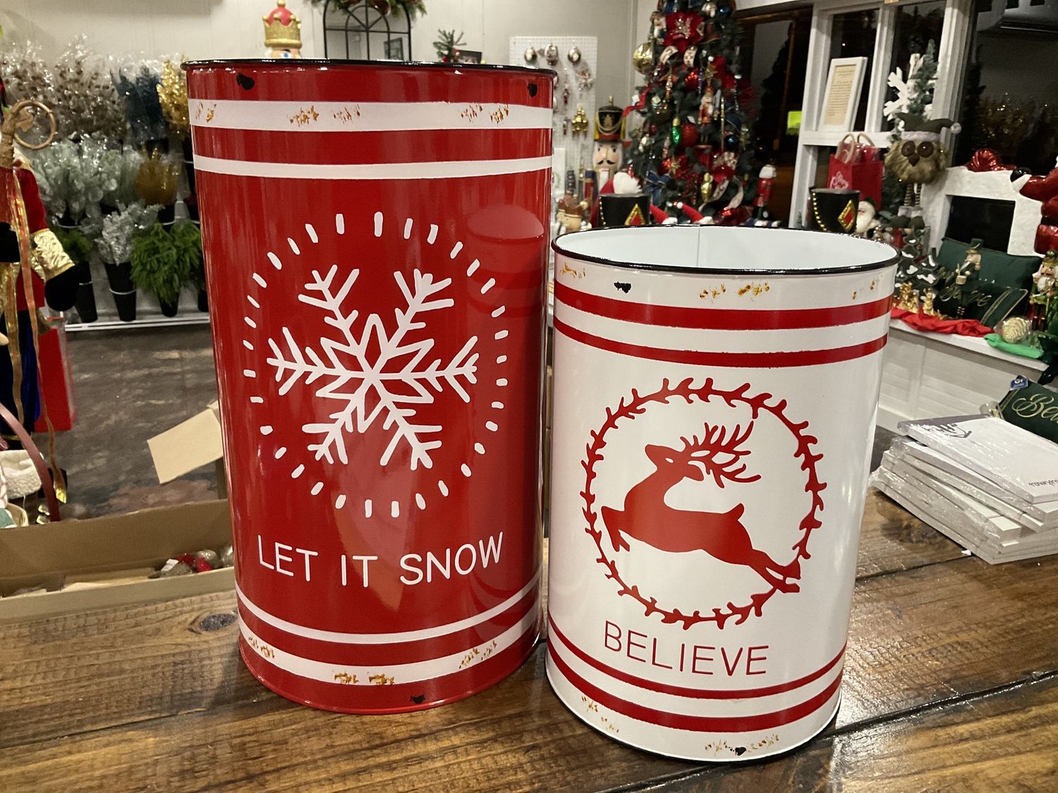 Set of two let it snow and believe distressed metal buck