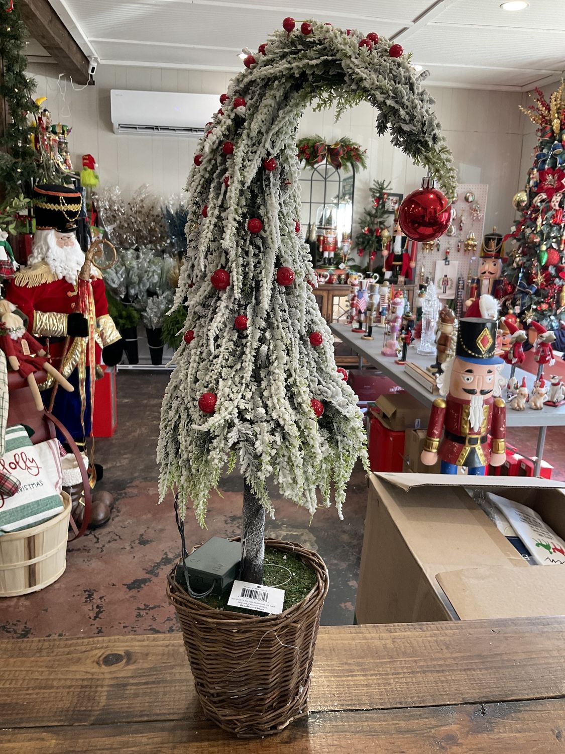 Large curly Christmas tree with LED lights