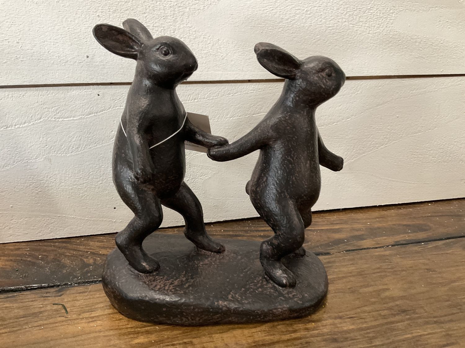 Rabbits walking hand in hand