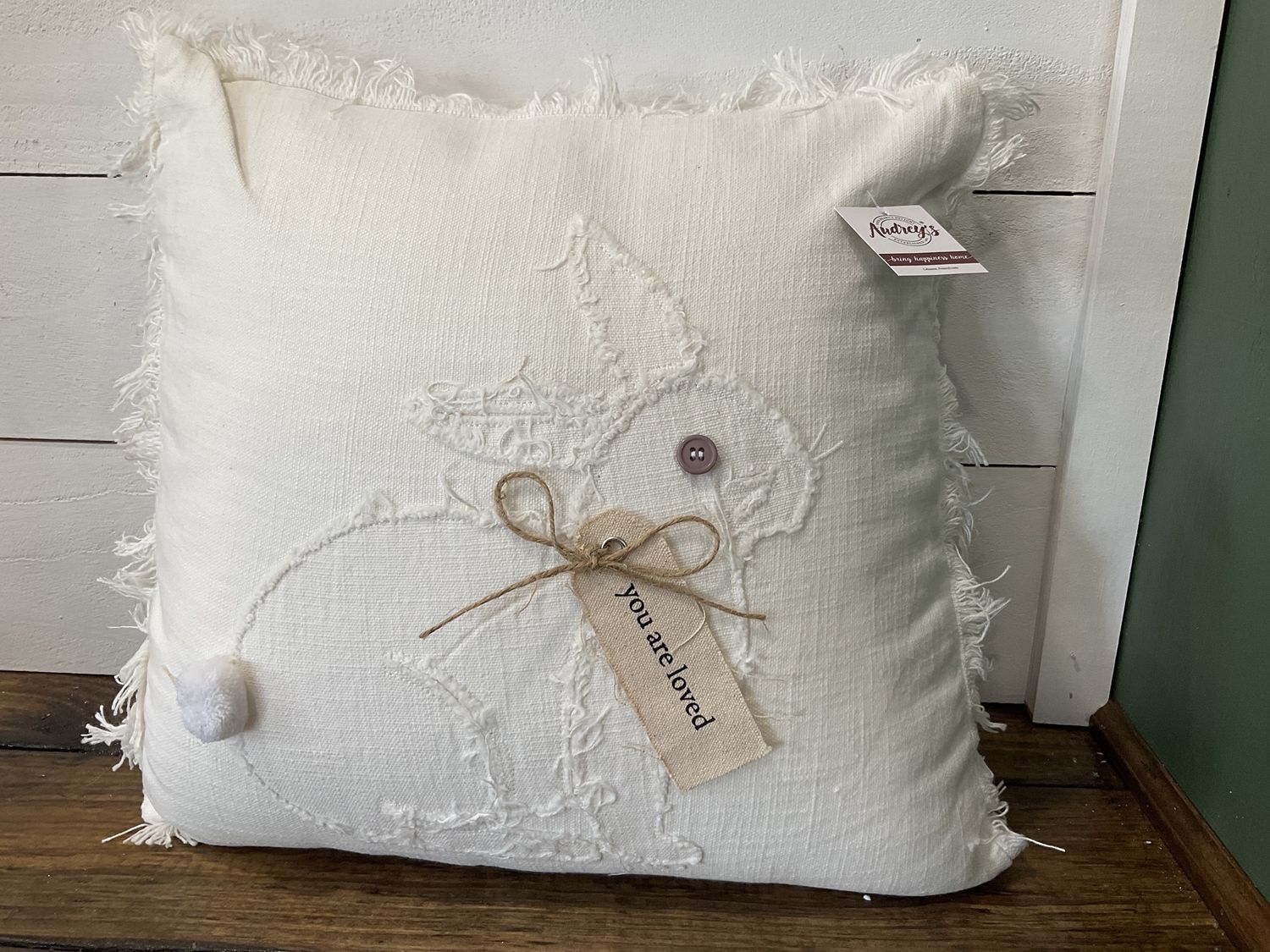 Raggedy rabbit with fabric tag pillow