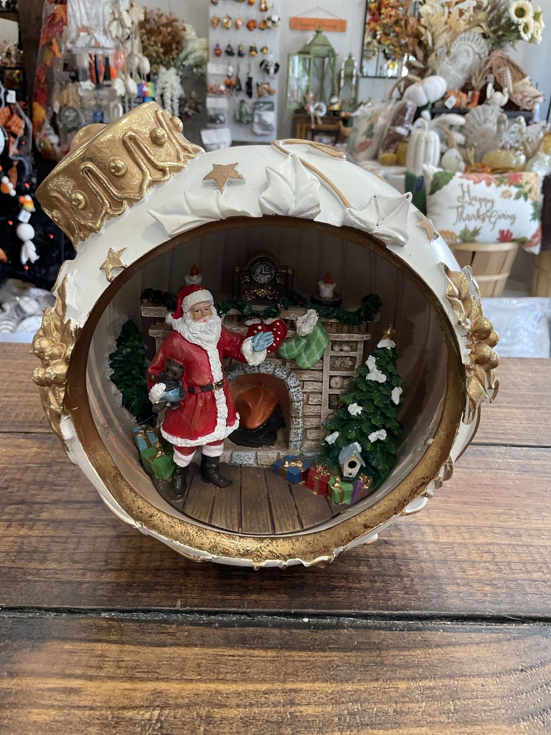 8” Lighted ornament Santa by fireplaceI