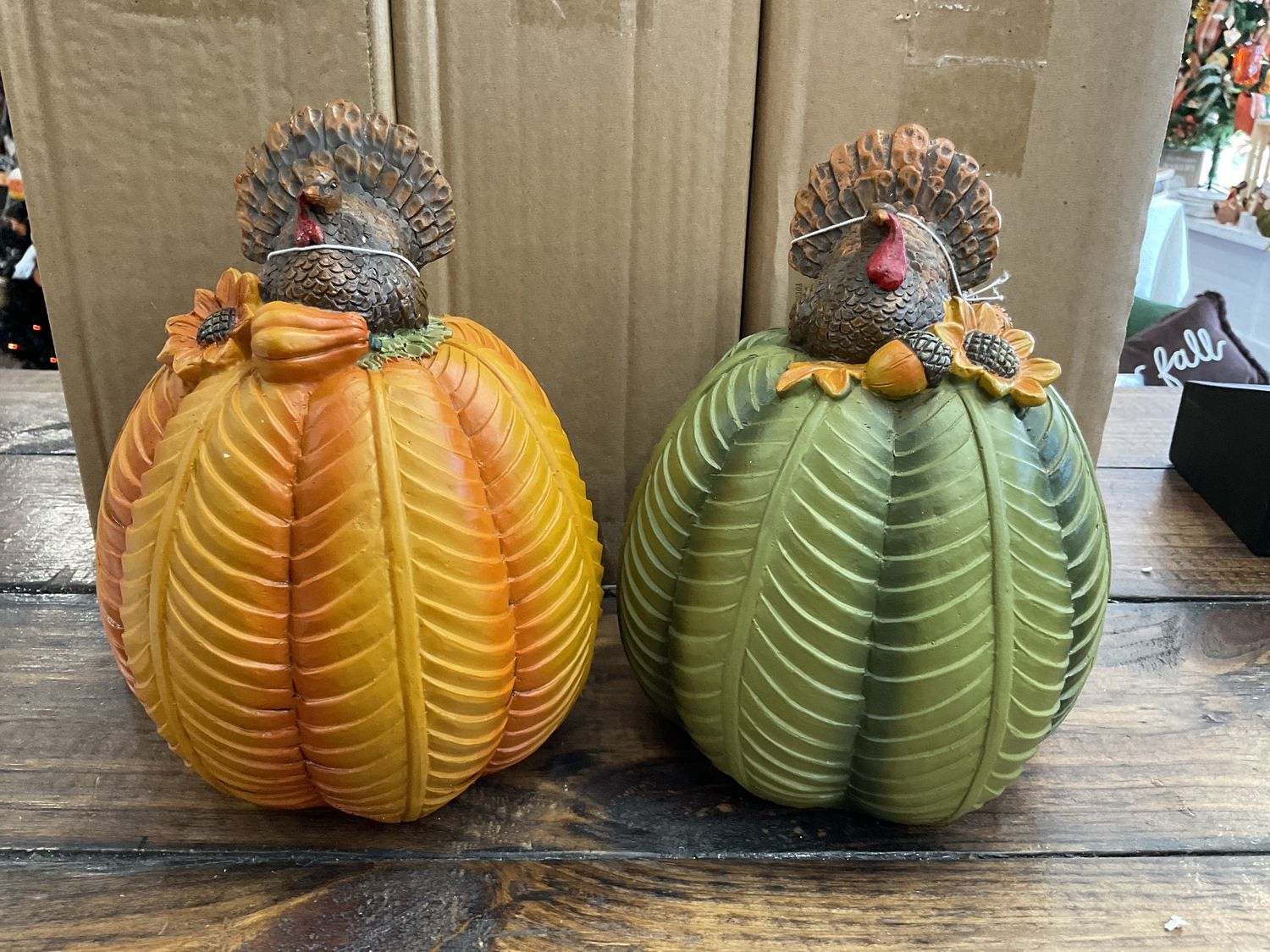 Turkey on top of green or orange pumpkin two assort