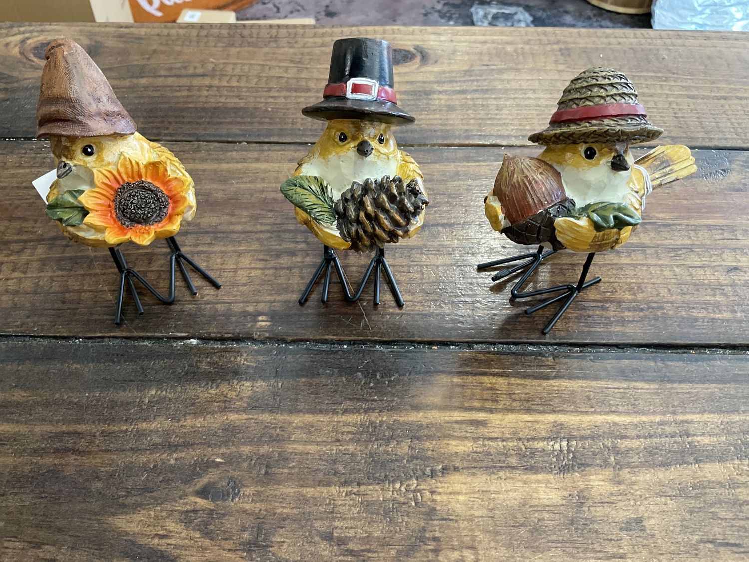 Bird in Fall colors with metal feet