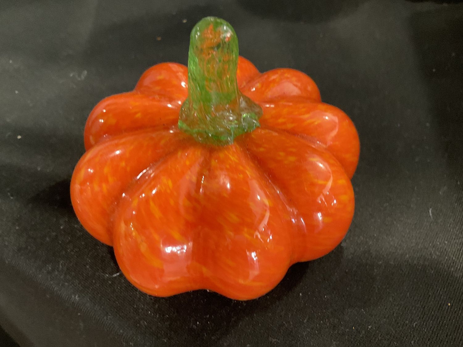 Hand blowing glass pumpkin