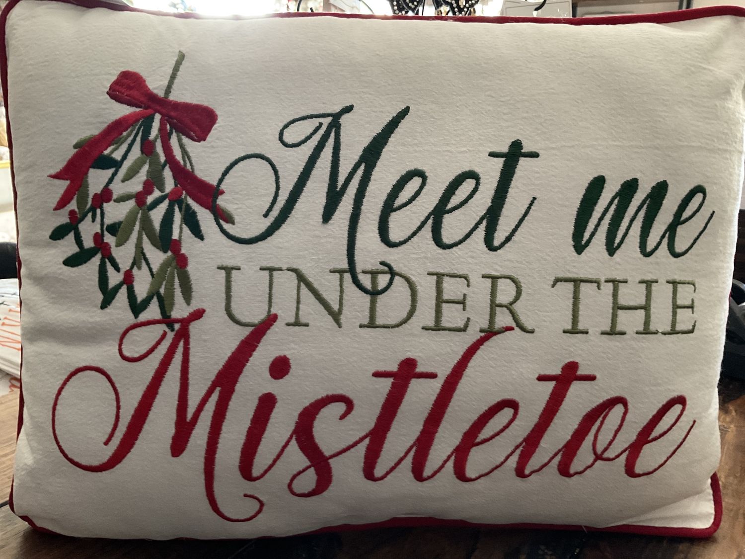 Under the mistletoe pillow