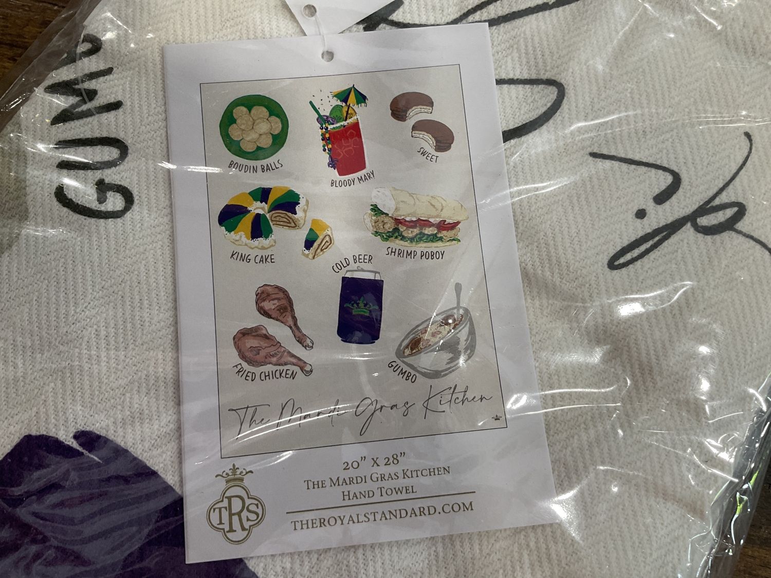 The Mardi Gras Kitchen tea towel