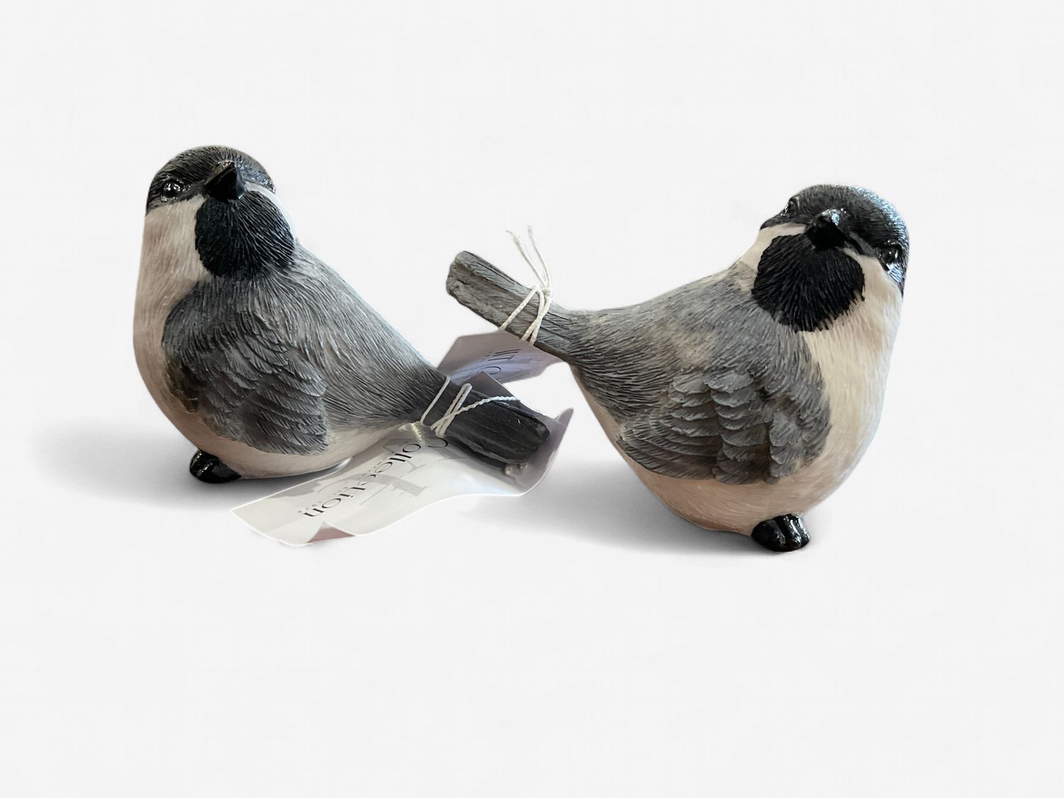 2 assorted blue and white resin birds