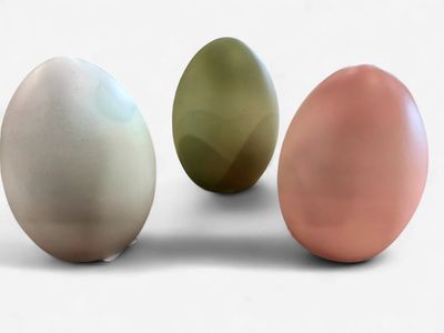 Three assorted large blue, green and pink resin eggs