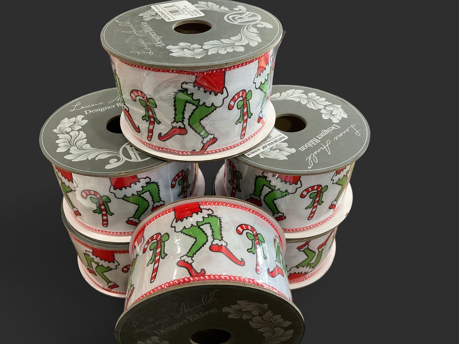 Green legs dancing Christmas ribbon