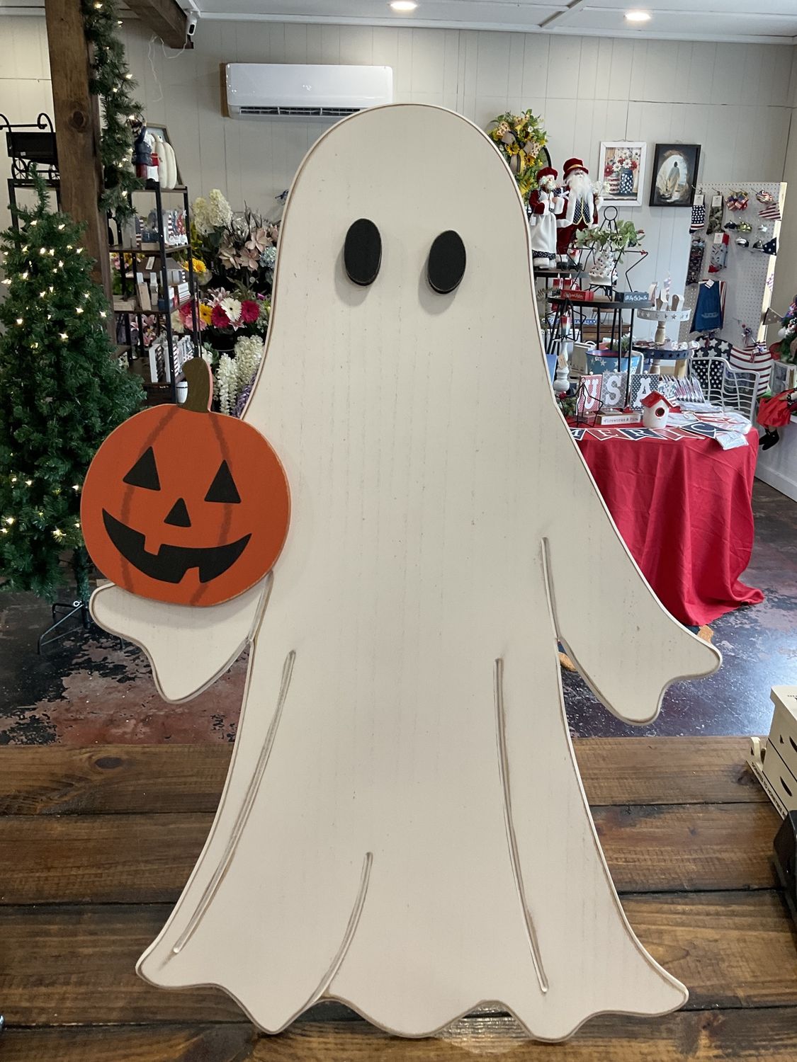 Ghost Holding Pumpkin