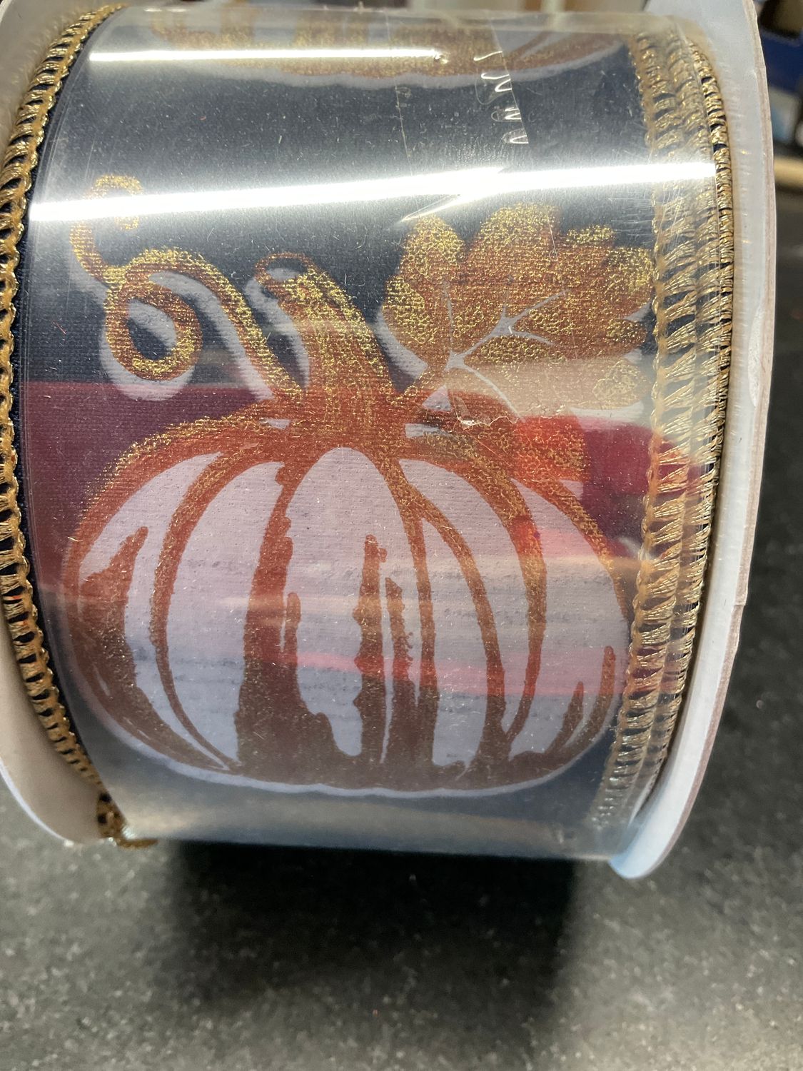 Modern pumpkin print on navy ribbon with gold