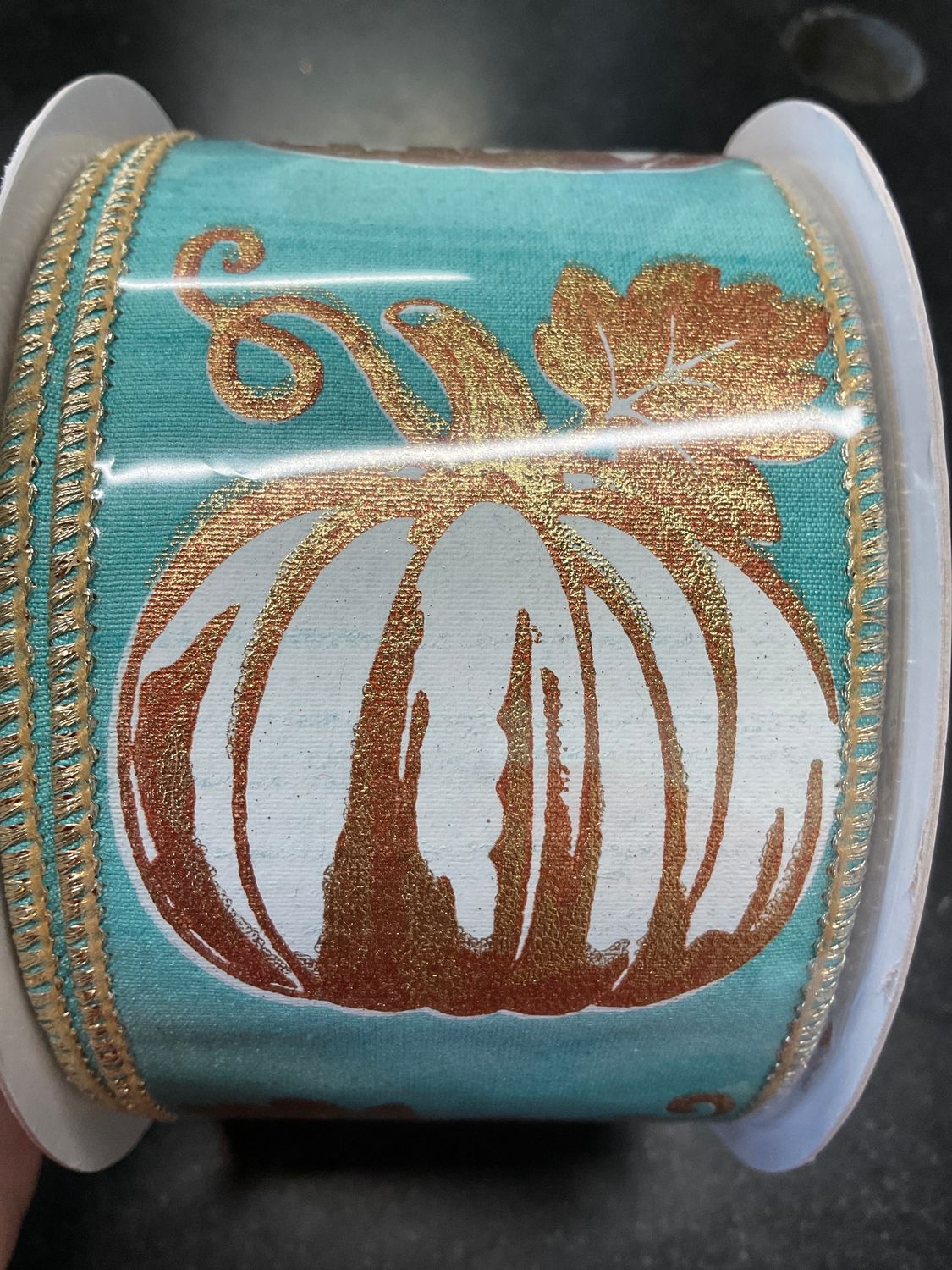 Modern pumpkin print on aqua ribbon with gold