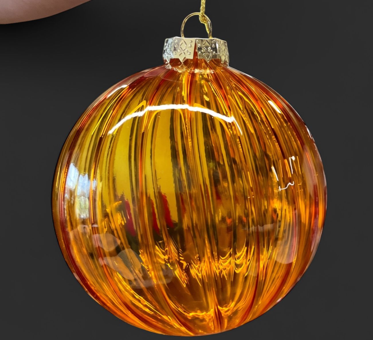 Vertical stripe orange clear glass ball