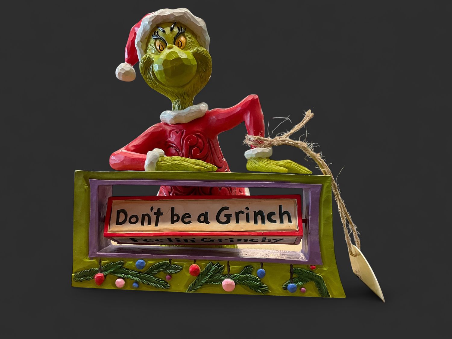 Grinch with rotating sign