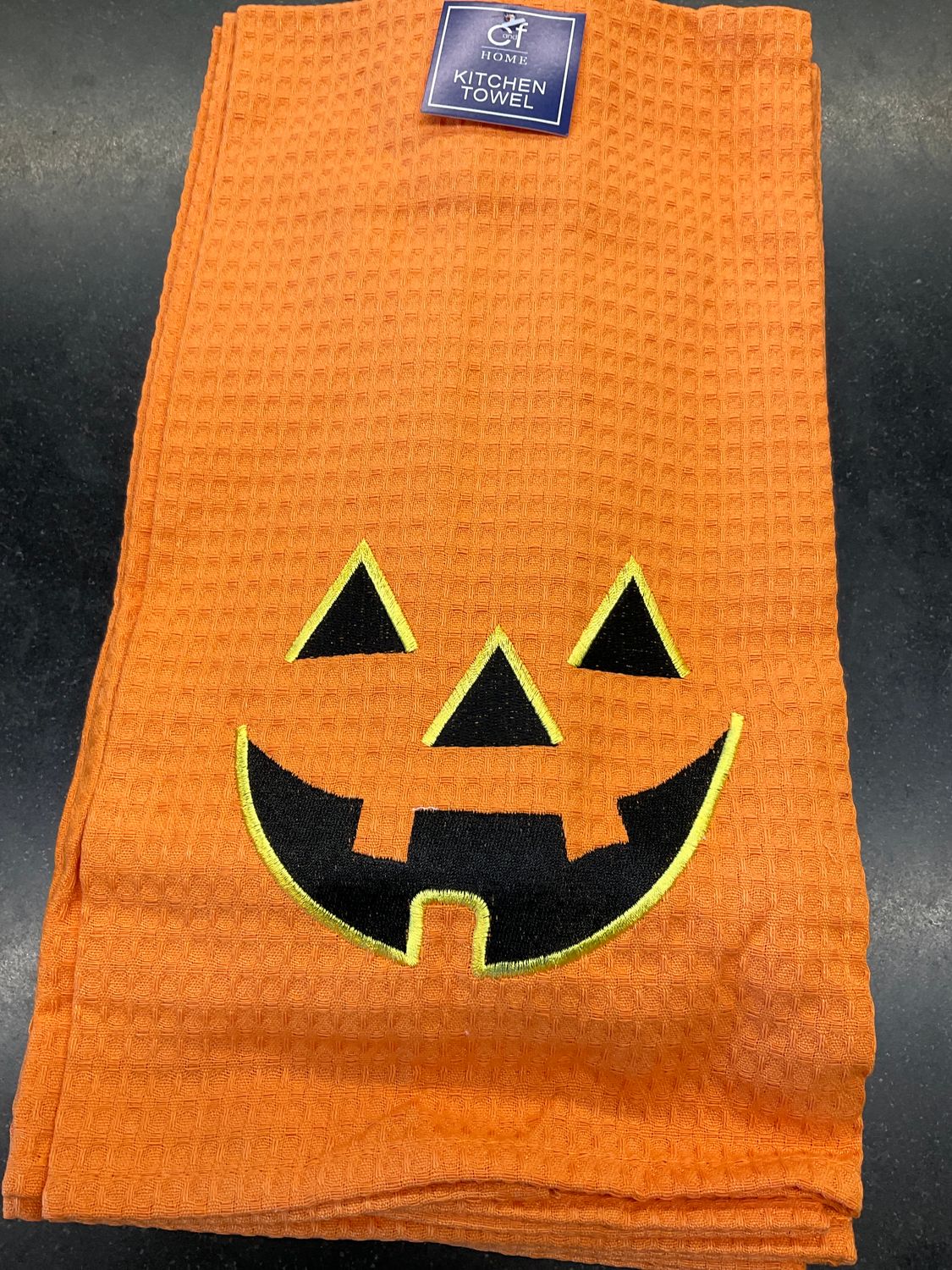 Jack-o’-lantern tea towel